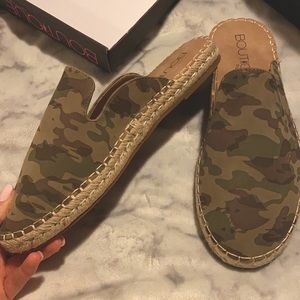 Never worn, still in box, size 9 camo slides